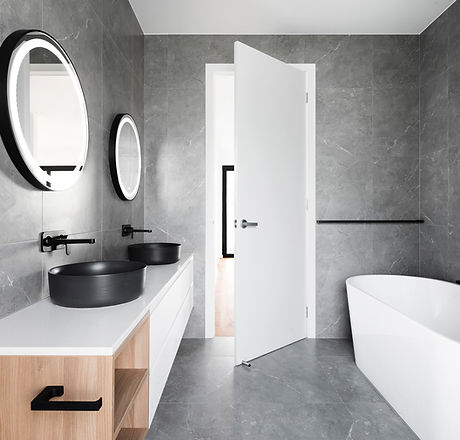 Modern Bathroom with Gray Tiles and Stylish Tub