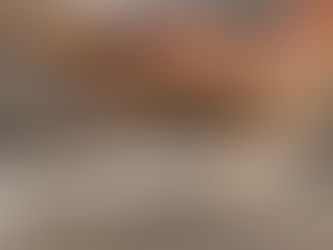 woman rolling out pasta