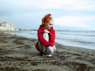 A woman alone on a beach