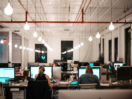 "Electrifying Transformations: Illuminating Office Spaces with Professional Renovations"