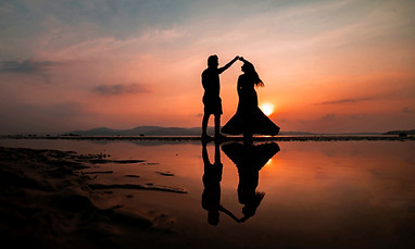 couple dancing on the beach