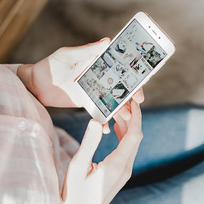 Person on smartphone tagging and introducing friends to Dan Olesen online