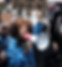 Woman in Crowd with Megaphone