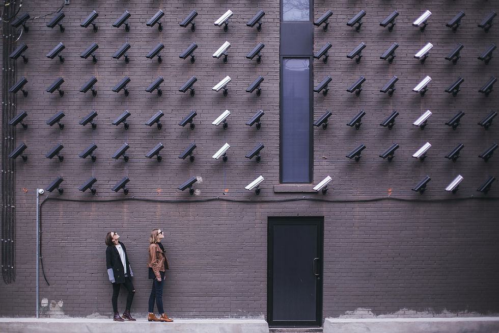 Image of several security cameras by Matthew Henry