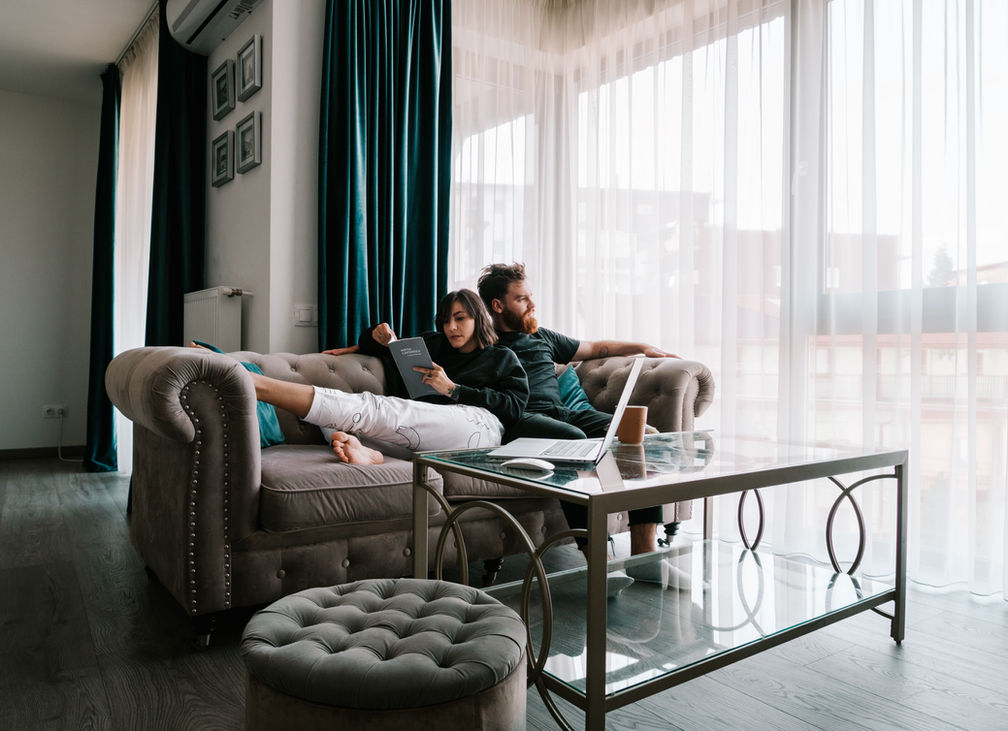 Couple lounging on the couch