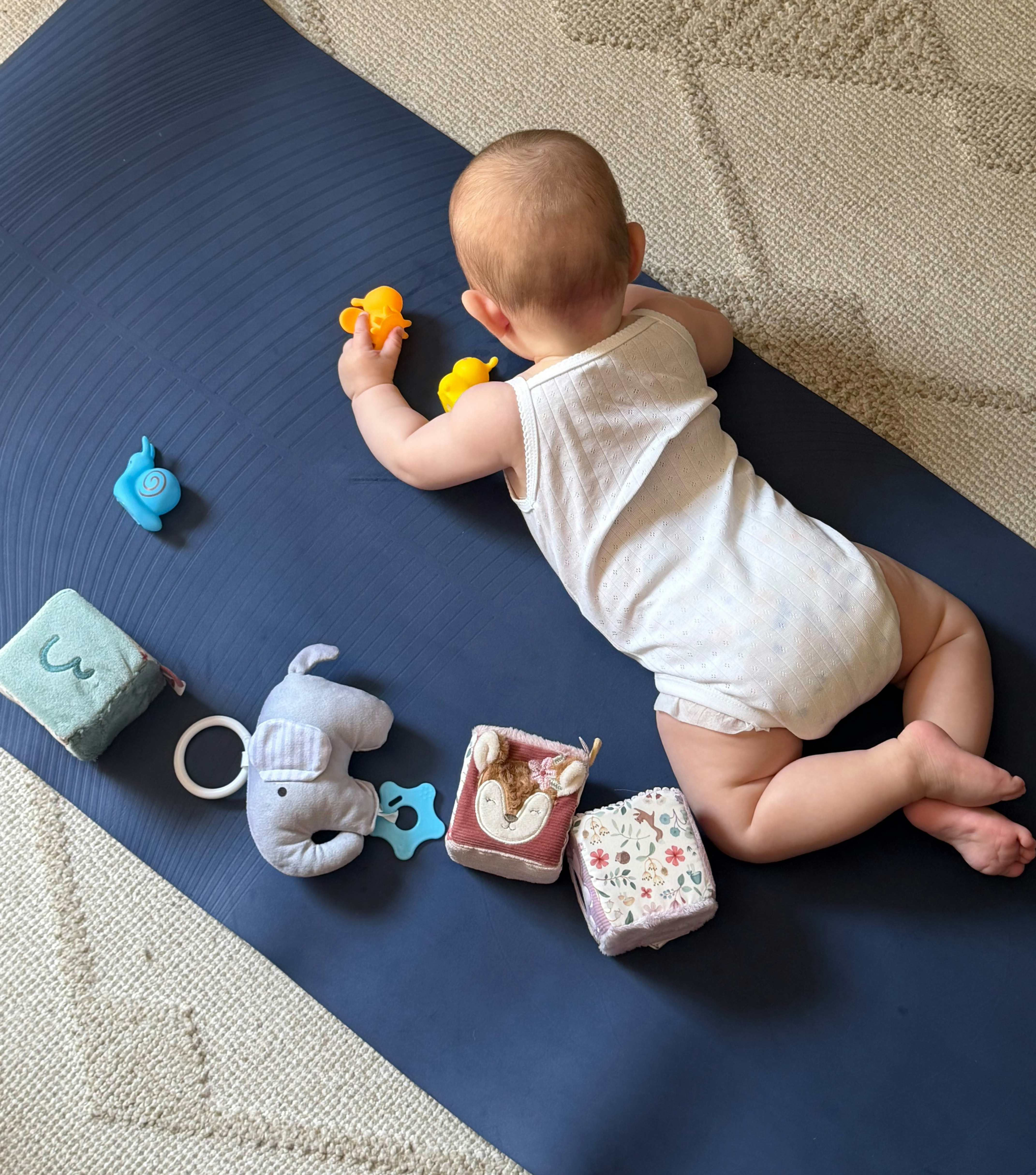 baby playing in tummy time