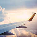 Plane wing in flight, European city breaks with Stride Tours