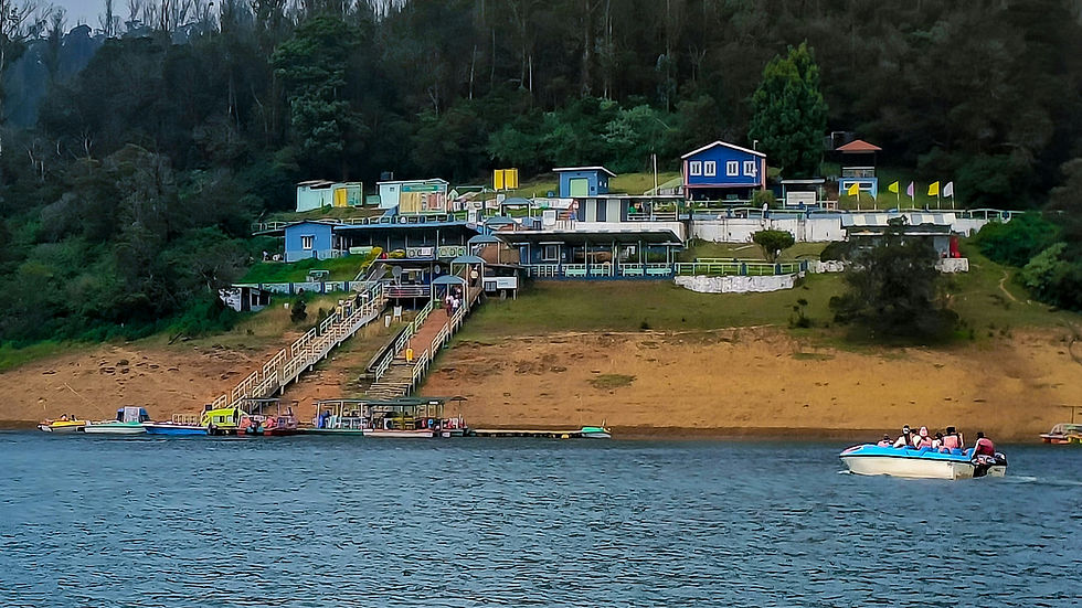Pykara Lake, a hidden lake in Nilgiris, surrounded by forests – perfect for boating and nature walks.