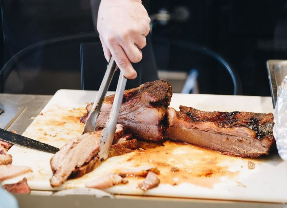 Close-up view of smoked ribs with barbecue sauce on a plate